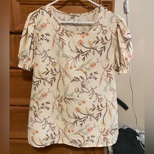 les amis puff sleeve top. Cream with peach, light green and brown accents.